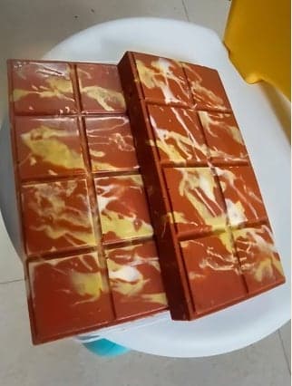 Two handmade marbled chocolate bars from the Onederful Bakes kitchen